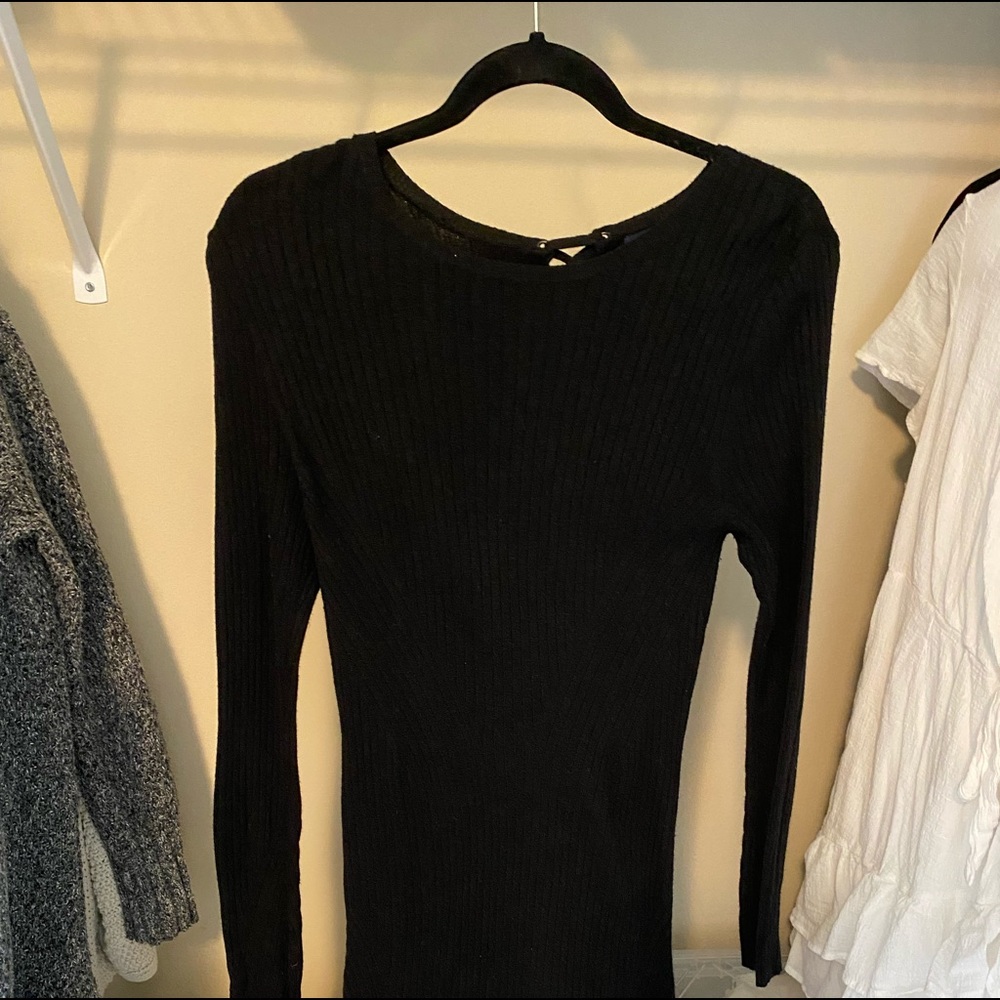 I am selling a bodycon sweater dress. It is ribbed and stretchy.